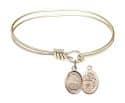 5 3/4 inch Oval Eye Hook Bangle Bracelet with a St. Sebastian / Fishing charm.