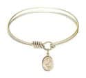 6 1/4 inch Round Eye Hook Bangle Bracelet with a St. Scholastica charm.